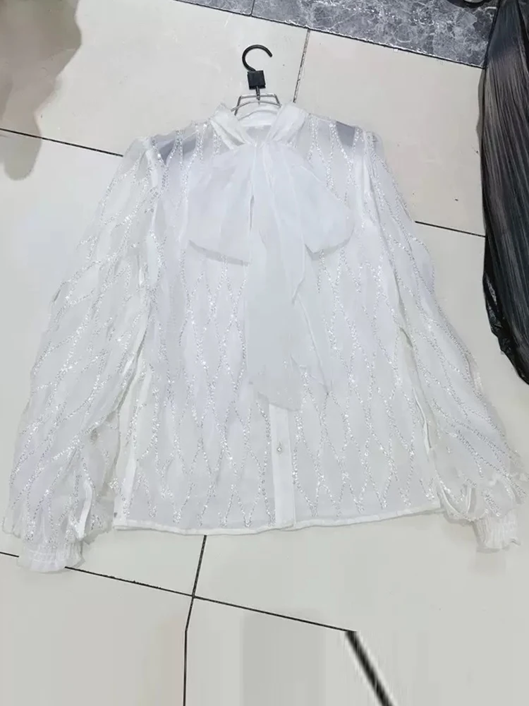 

Heavy industry single-breasted openwork sequins perspective bow long-sleeved shirt spring and summer 2025 new fashion Joker blou