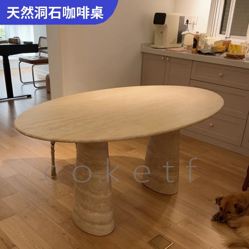 

Nordic wabi-**** style oval natural travertine dining table, light luxury western restaurant designer large dining table