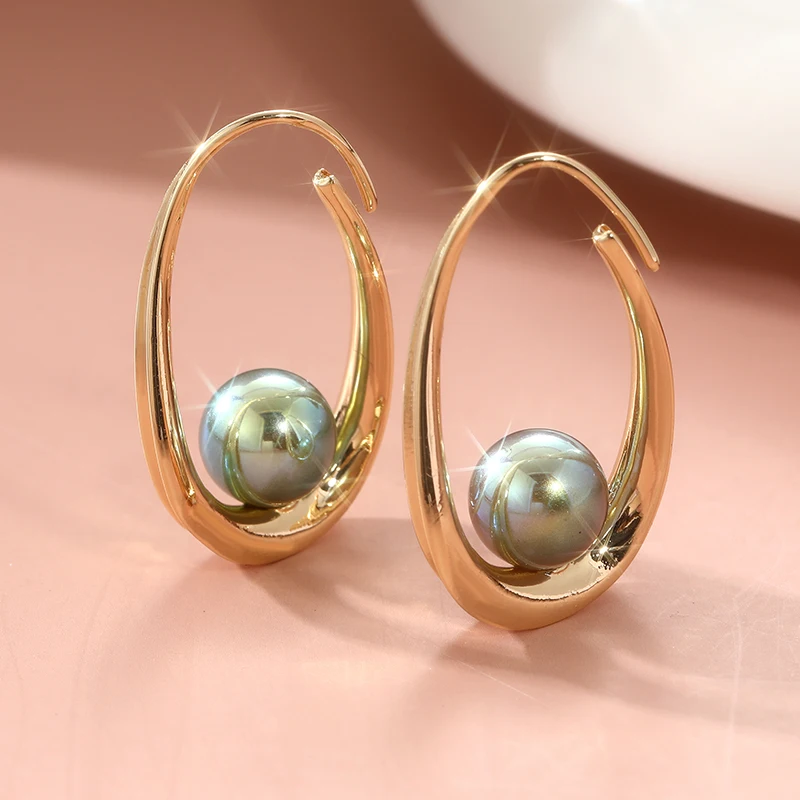 Luxuriöses Design Goldfarbene Ovale Creolen für Damen, Eleganter Schmuck, Tropfen-Ohrringe, Beliebte Accessoires