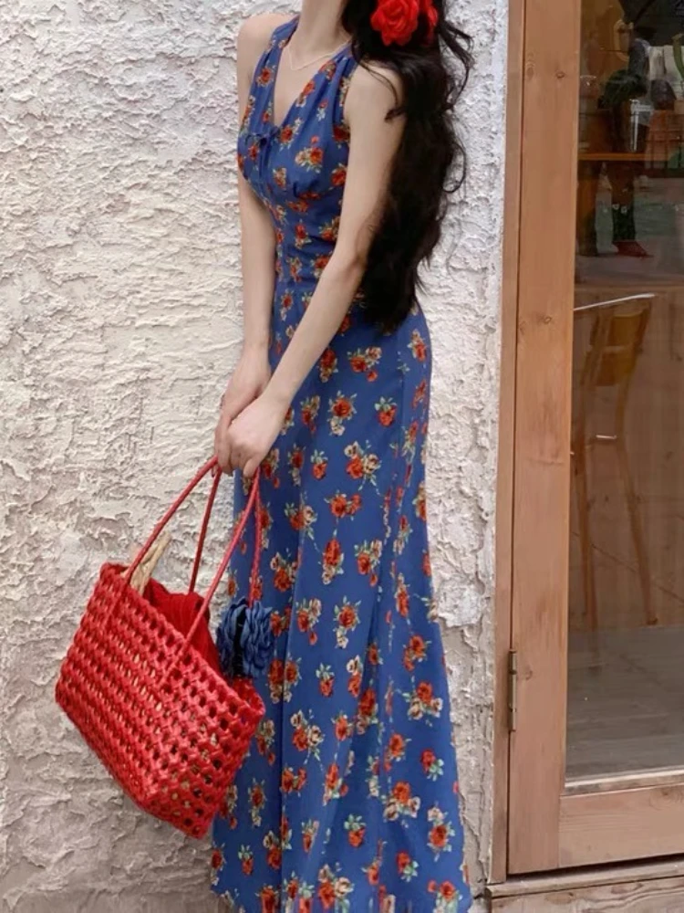 Abito floreale da donna con atmosfera di temperamento dimagrante con scollo a V blu in stile retrò Hong Kong