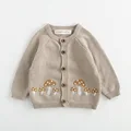beige sweater