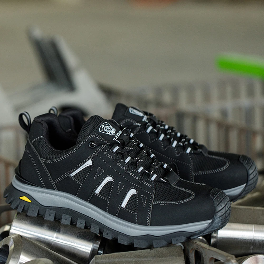 Scarpe con punta in acciaio Scarpe da lavoro comode Scarpe da ginnastica resistenti alle coltellate Scarpe da ginnastica di sicurezza con lacci per costruzioni industriali