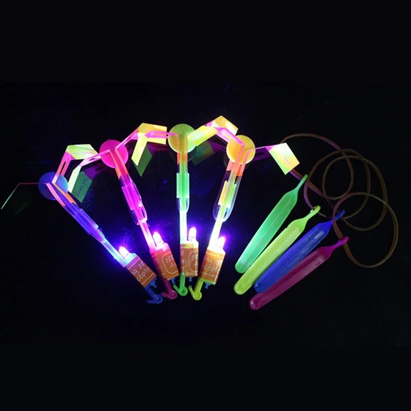 Jouets drôles de sport de plein air, lumière LED, flèche, fusée, hélicoptère, fronde, avion volant, élastique, catapulte, libellule en bambou, cadeau