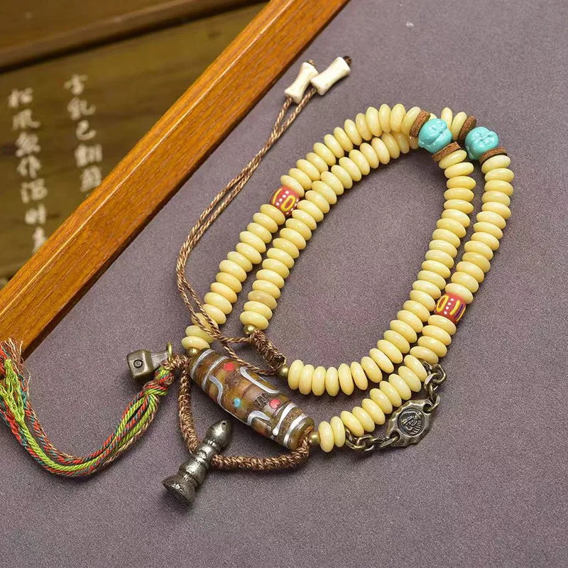 

Таблетка с обратным потоком 108, бирюзовая цветная глазурь, инкрустированные бусинами из кости яка, медные аксессуары