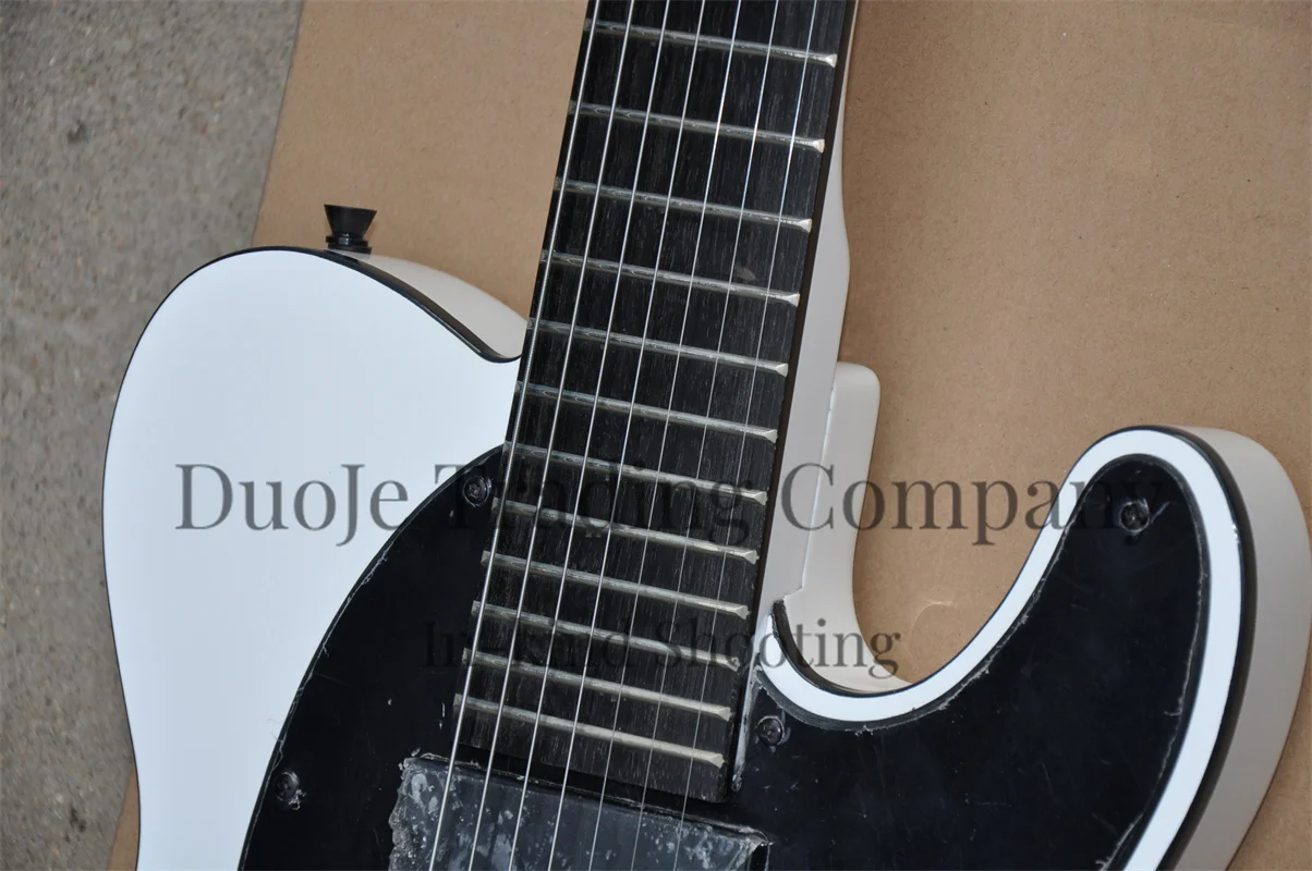 7 string electric guitar White body neck Set In body Strings Though body Black fixed bridge Ebony fingerboard support customizat