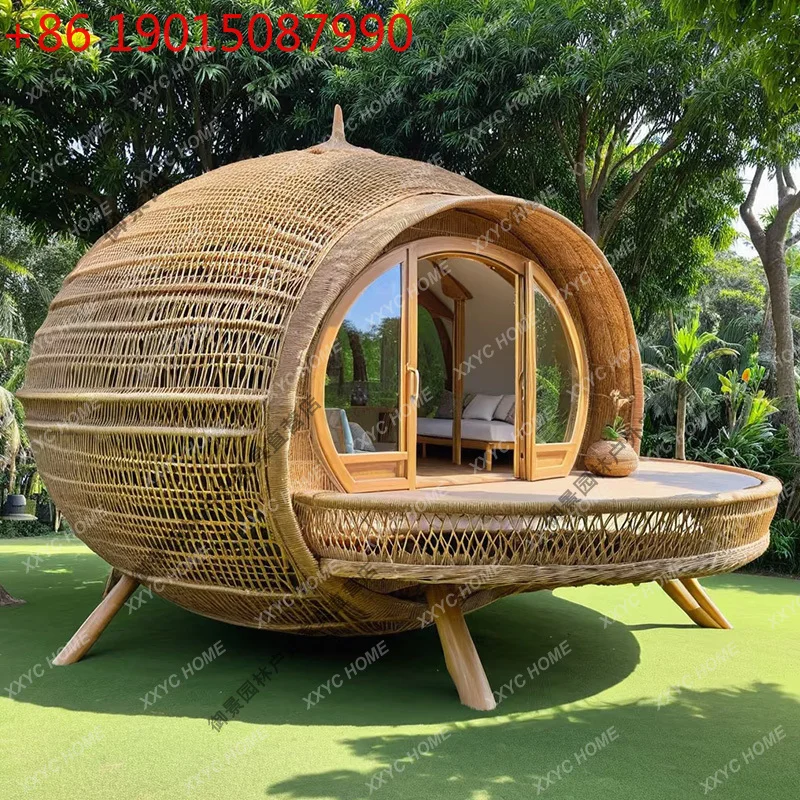 

A Rattan house holiday wind clock in the photo thatched house B & B landscape room seaside creative cottage