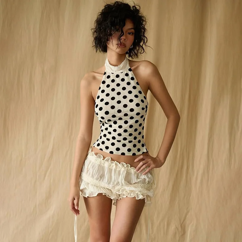 

Spring/Summer 2025 Elegant Women's Dress with A Slimming Curve and A Retro Polka Dot Halter-neck and Cinched Waistcoat
