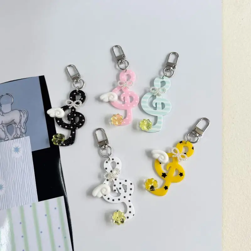 Niedlicher Acryl-Musiknoten-Schlüsselanhänger mit zierlichem Flügel-Dekor, tragbarer Taschenanhänger, liebenswertes Geschenk für Klassenkameraden zum Schulanfang. – Detail 3