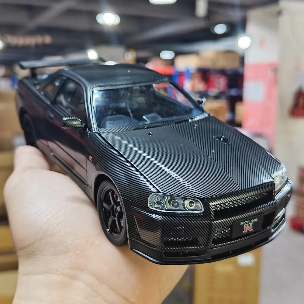 

Модель спортивного автомобиля 1:24 GTR R34 с карбоновым покрытием, литая под давлением, из сплава, игрушка для детей, подарок
