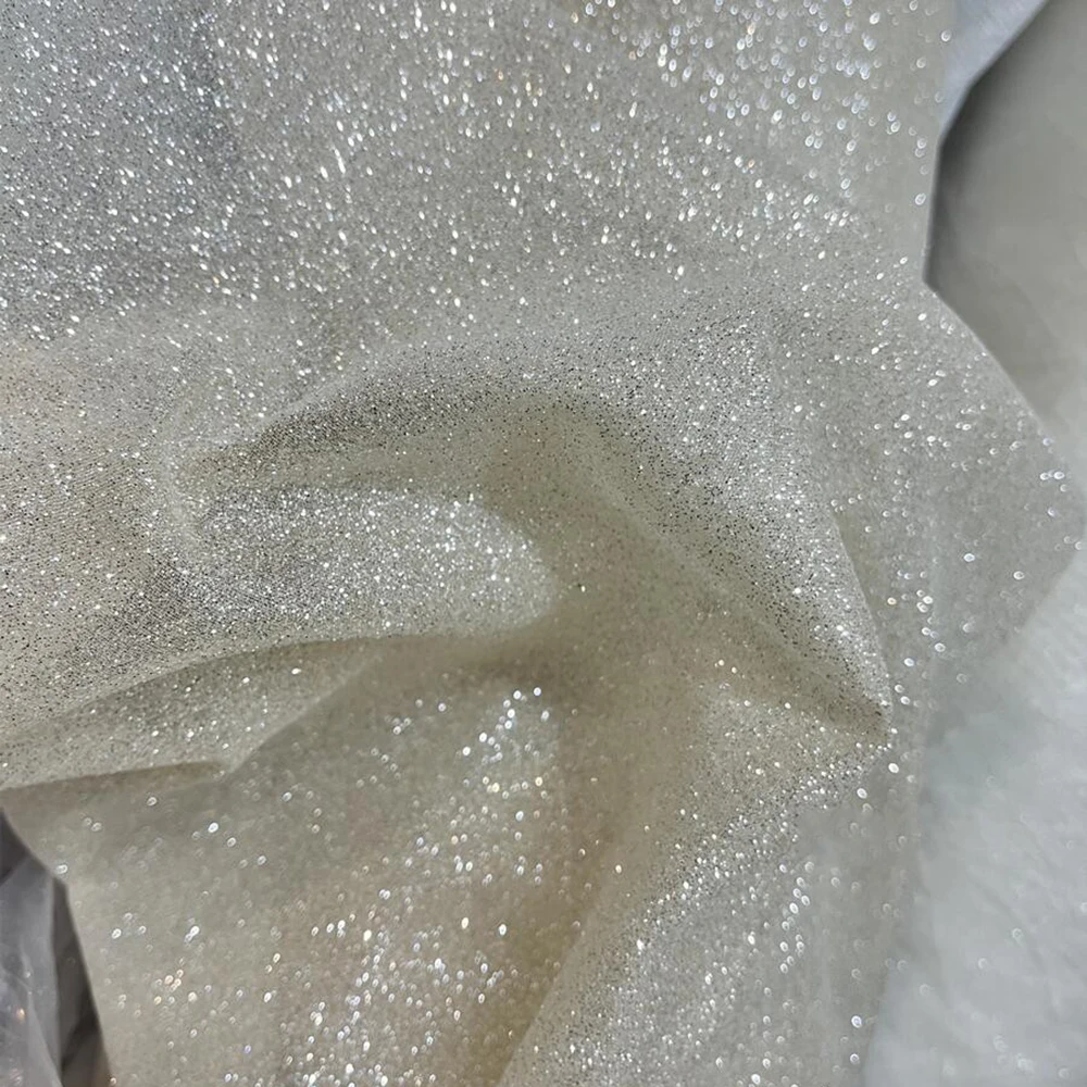 Ivory silver glitters and is c - огляд і ціна Crystal Mesh Fabric