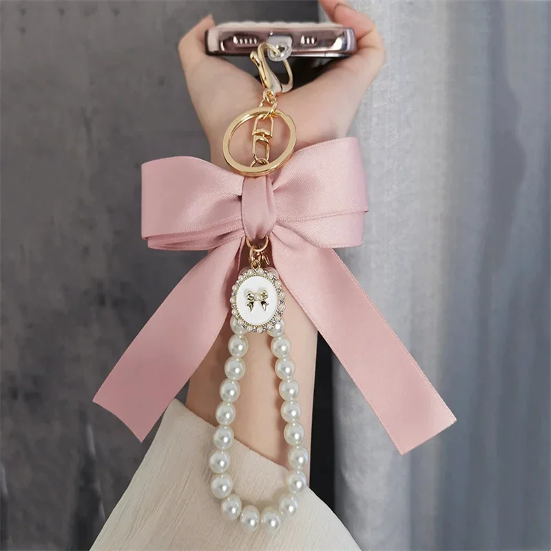 

Korea Cute Pink Ribbon Bowknot Pearl Keychain Sweet Fashion Keyring Accessories Metal Buckle Phone Case Women Bag Charms Pendant