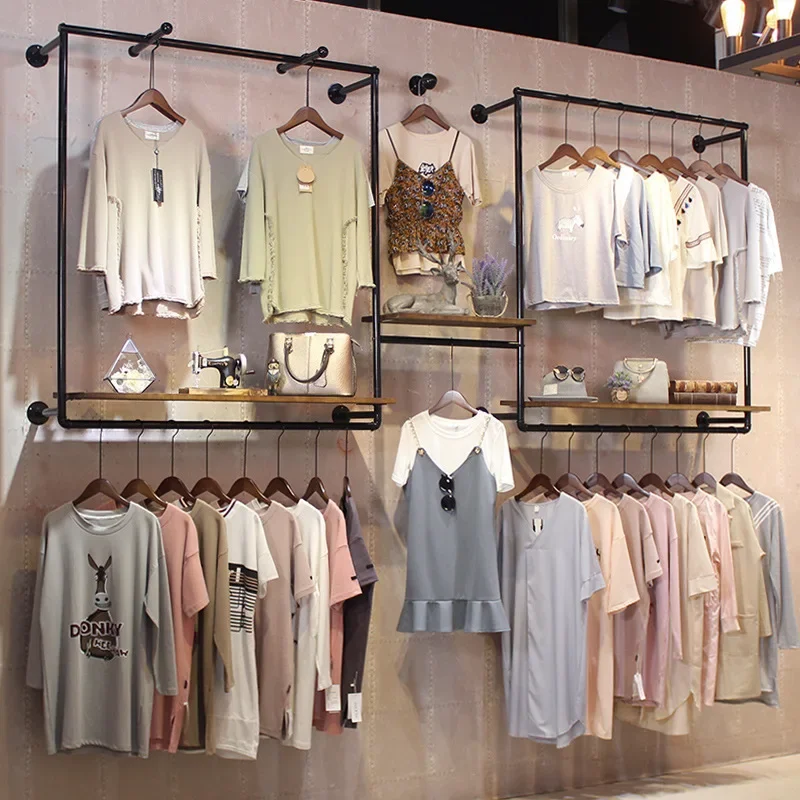 Clothing store display rack, rackfor clothes, floor-to-ceiling hanging clothesrack, women's clothingshelf, clothespole.