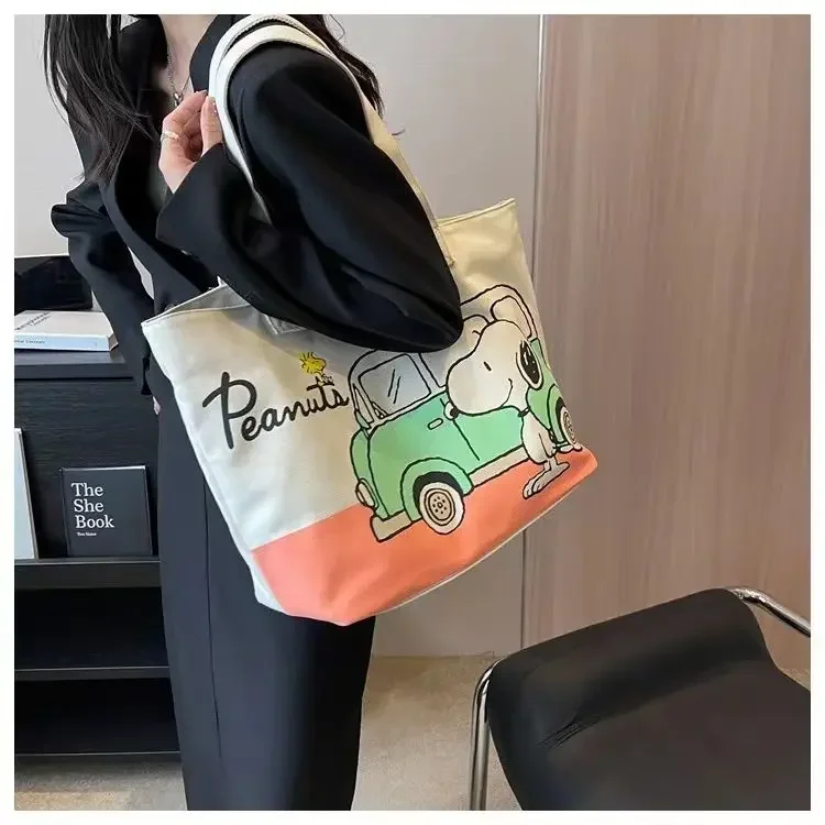 Snoopy Girl Neue niedliche Cartoon-Mode, vielseitig einsetzbar, lässig, für Reisen, leicht, große Kapazität, Aufbewahrung, tragbare Umhängetasche aus Segeltuch – Detail 6