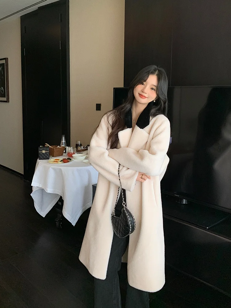 Dayaier 秋冬新スタイルロングシープスキンコート女性の非対称スタンドカラー 3 ボタン通勤ファッションウール
