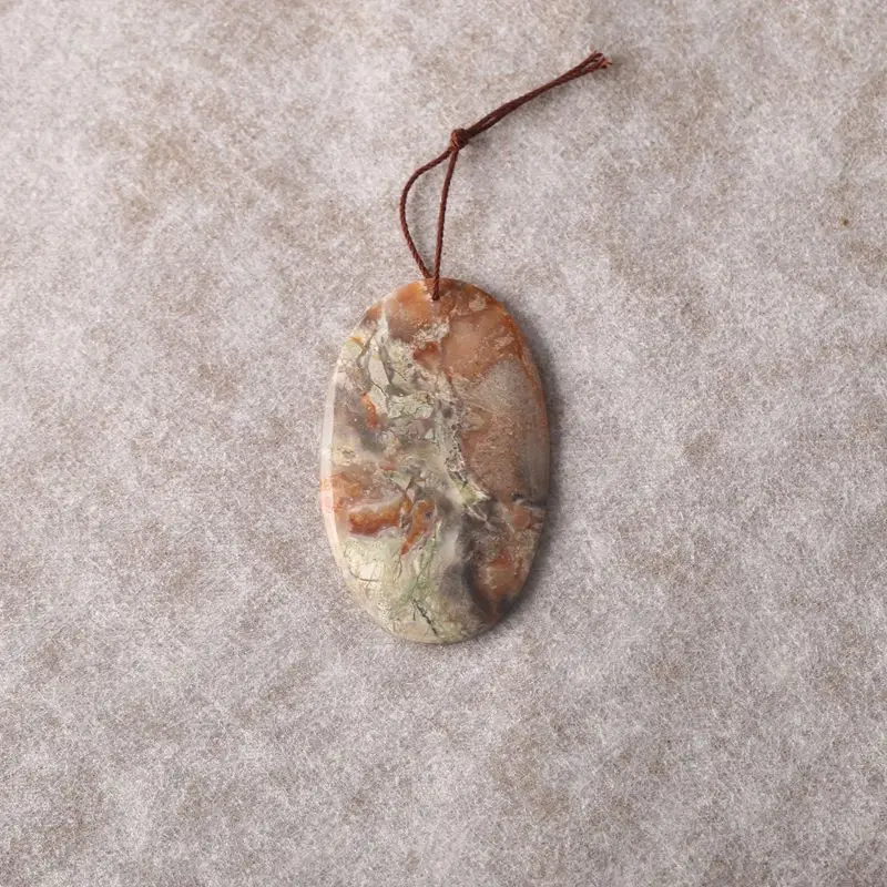 

Polished Mushroom Jasper Oval Pendant on Brown Cord Natural Artistic Gemstone for Boho & Earthy Jewelry Designs 58x35x5mm-16.2g