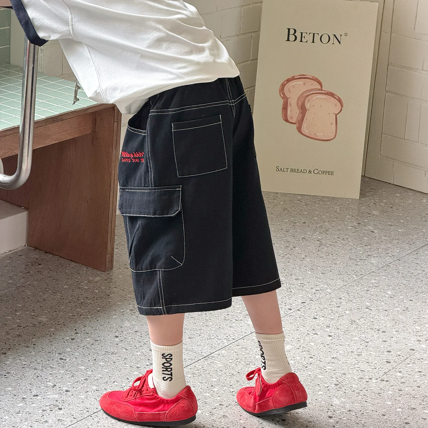 Boys Pants 2026 Spring And Summer New Children's Clothing Korean Style Boys And Girls Black Bright Line Five Minutes Pants
