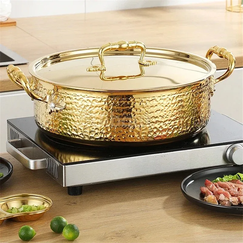 

Italian manual hammer printing pot 3-layer steel clear soup pot Commercial double flavor 304 stainless steel thick hot pot