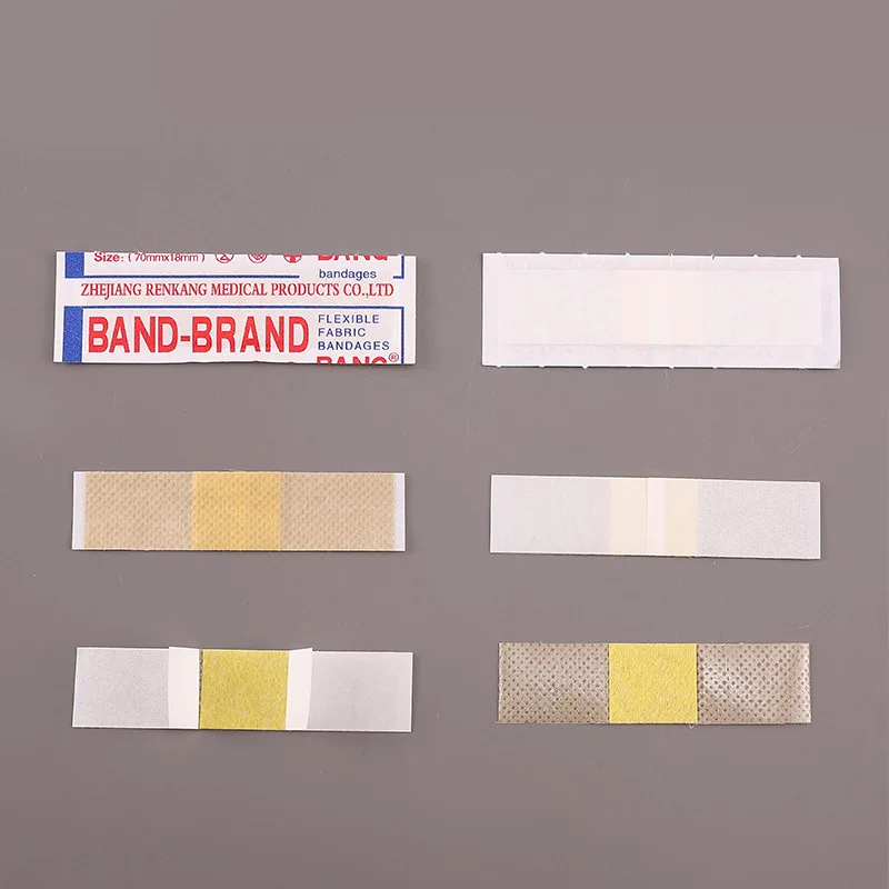 100 ชิ้นกันน้ํา Breathable Sticky Plaster Outdoor Camping ผ้าพันแผลทางการแพทย์ Hemostatic Dressing Patch Family Reserve Band Aid