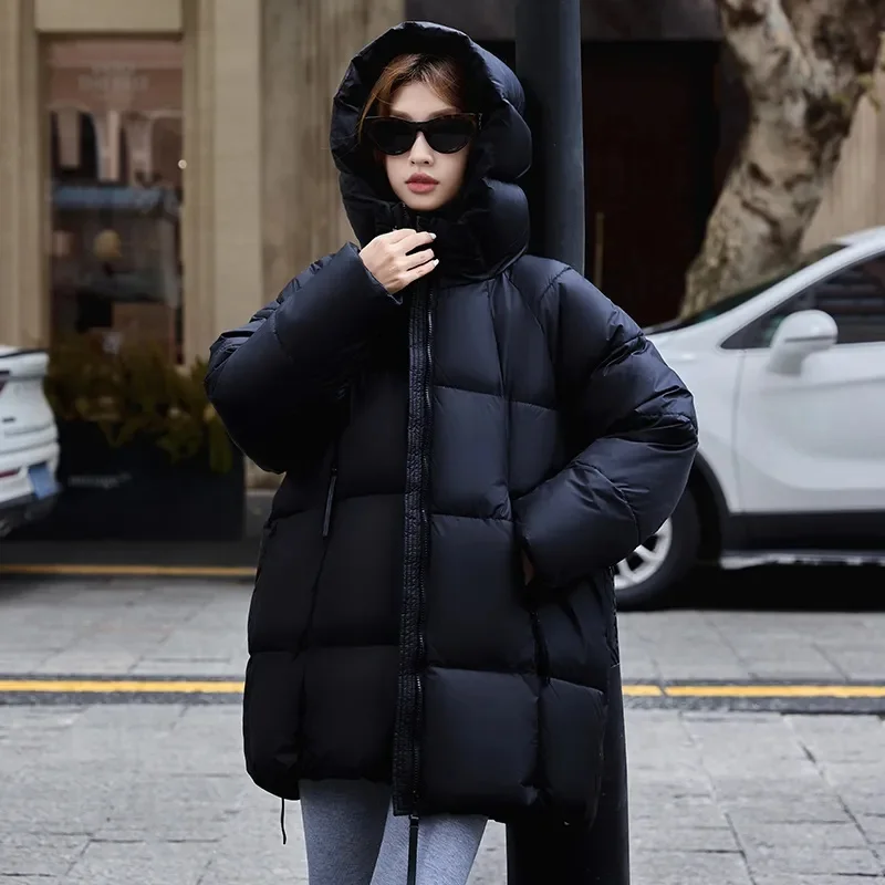 Lange Daunenjacke Frauen Parkas 2025Winter Neue Warme Baumwolle Gefütterte Mantel Damen Lose Windjacke Overwear Mit Kapuze Baumwolle Jacken Top