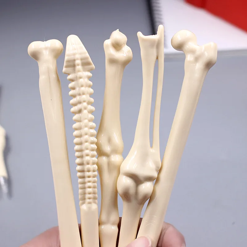 Wholesale 50 Pcs Ballpoint Pen Bone Shape Novelty Pen Writing Supplies School Office Stationery studend gift Blue black Refill