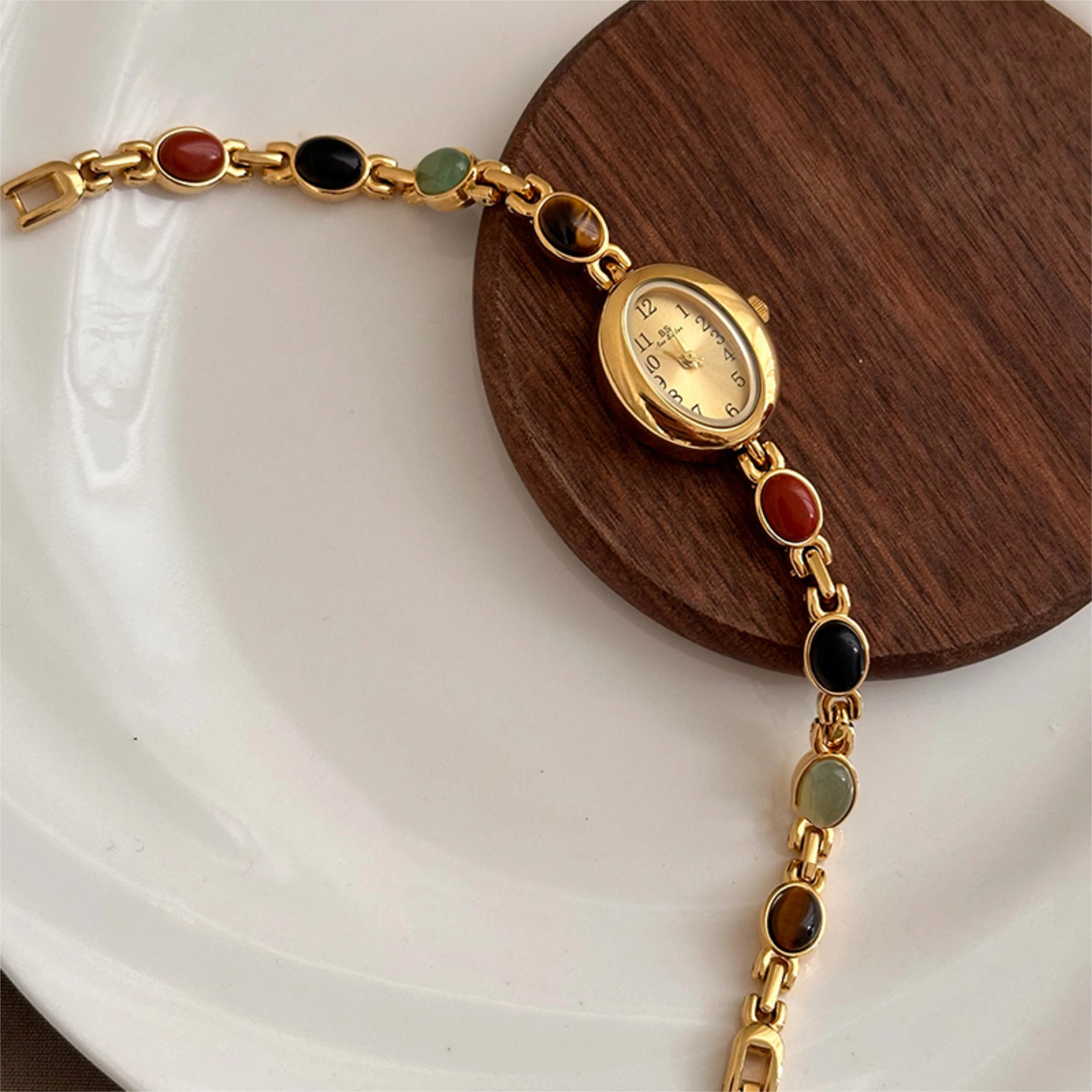 Relojes de lujo de alta gama para mujer, piedras preciosas de Esmeralda dorada, resistente al agua, ovalados, elegantes, de cuarzo, accesorios para mujer 2025