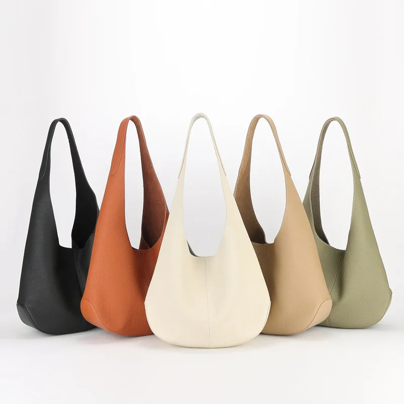 Bolso de mano informal de piel de vaca de primera capa importado de viento perezoso, bolso de cubo de moda de cuero para mujer, nuevo bolso Simple de gran capacidad