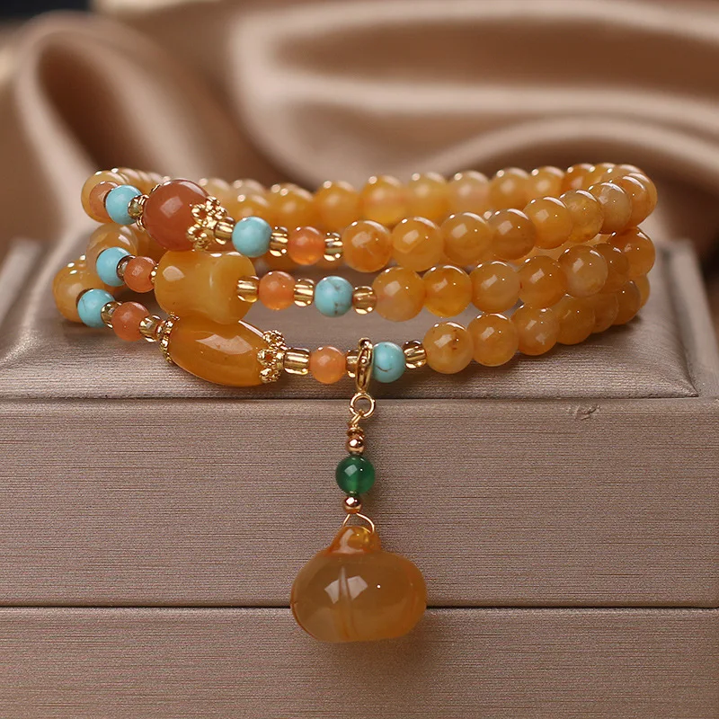 

Pumpkin beads gold silk jade beaded bracelet necklace