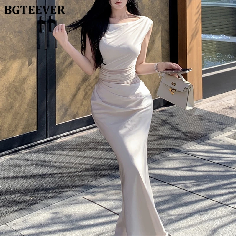 BGTEEVER فستان صيفي أنيق للسيدات نحيف مرقع من الساتان أنيق برقبة دائرية للنساء بدون أكمام فستان الورك