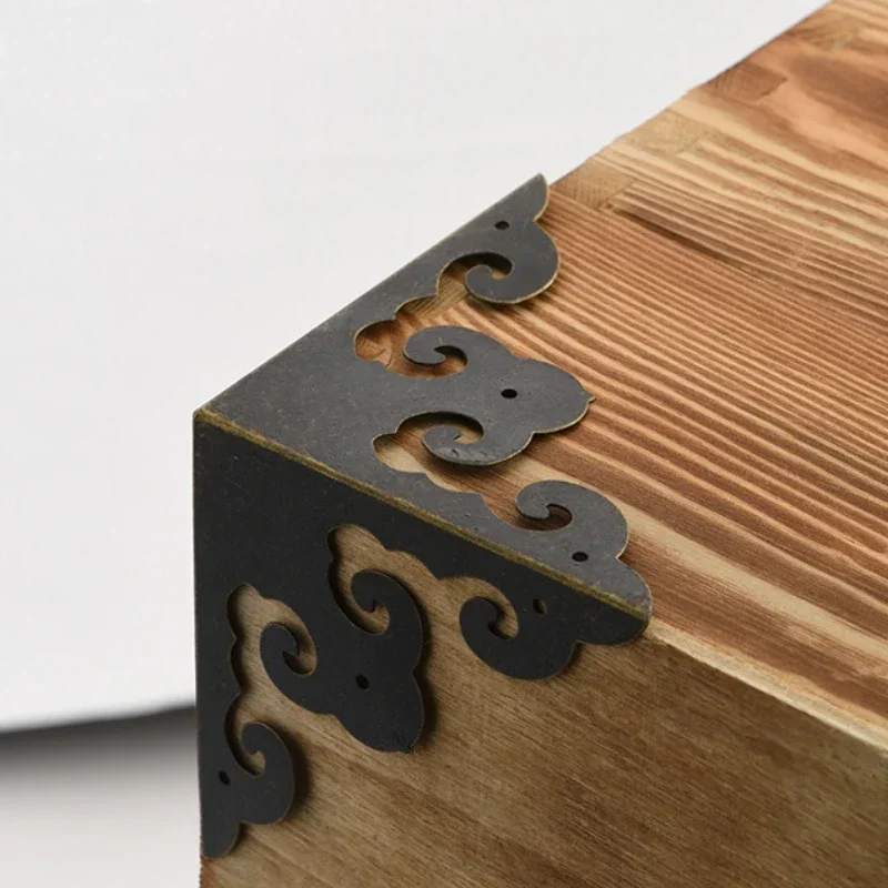 Antique Chinese furniture Ming and Qing iron corner code camphor wood box corner Xiangyun pattern package corner protection