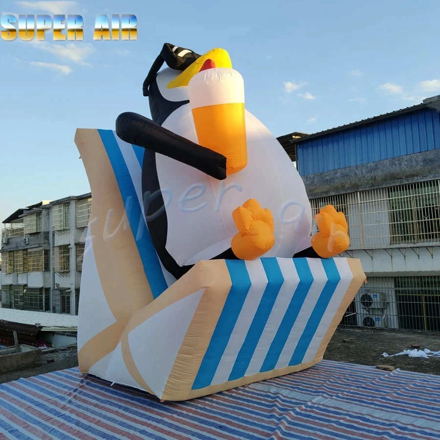 

New style animal model decoration inflatable penguin wearing sunglasses with drink for party