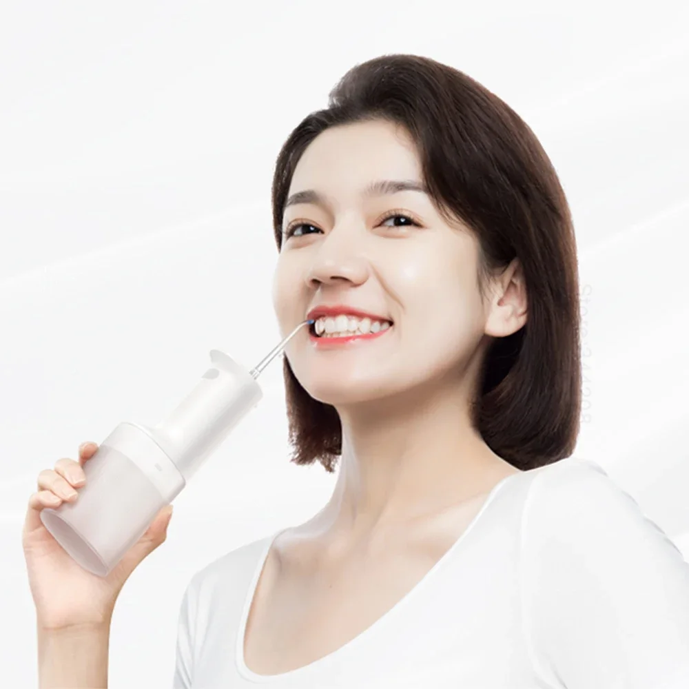 

Portable Oral Irrigator 2 MEO705 Dental Teeth Whitening Flosser bucal tooth Cleaner waterpulse Water Thread