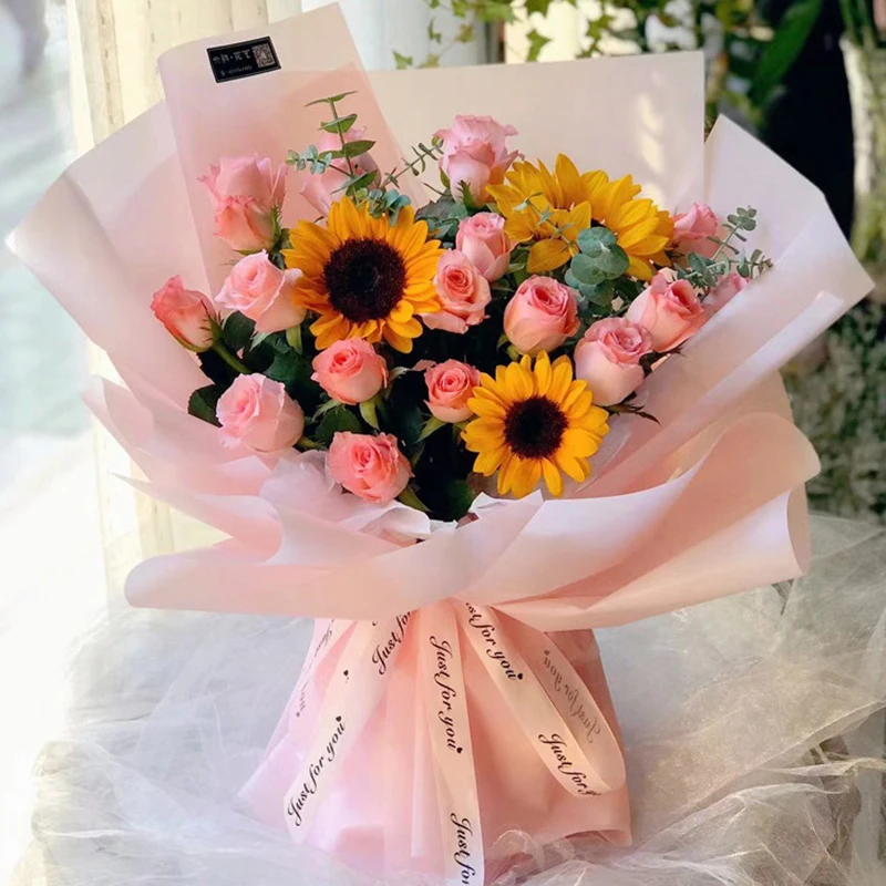 Carta da imballaggio per fiori rosa stile coreano confezione regalo semitrasparente Bouquet da fiorista materiale da imballaggio carta da imballaggio per fiori