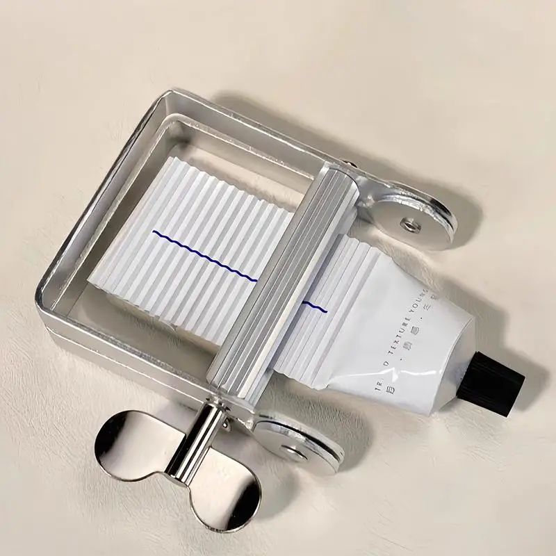 

Новый металлический выдавливатель для тюбиков с зубной пастой - большой многофункциональный роликовый дозатор для тюбиков с краской для волос, краской для ногтей и другими продуктами.