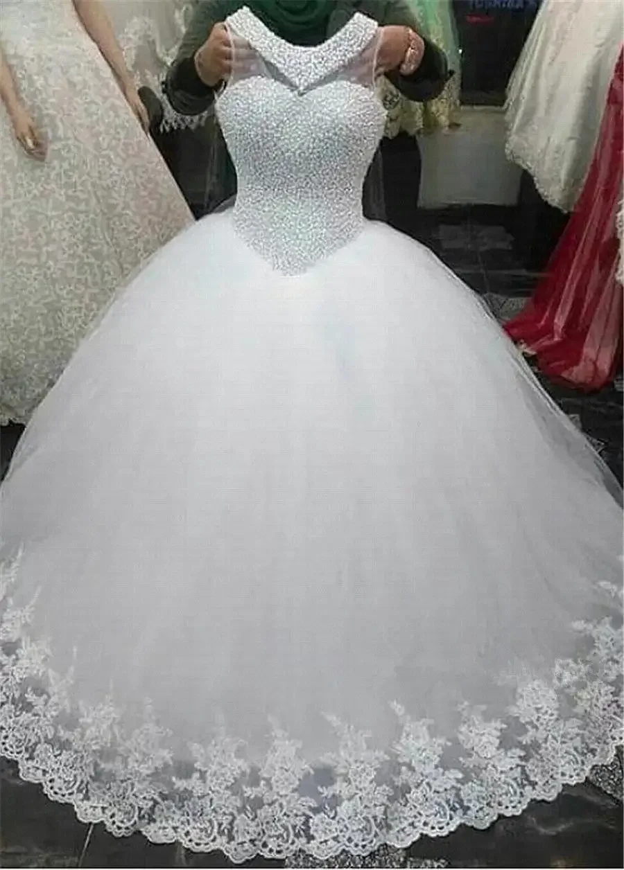 

Customize Hot Selling Luxury Heavy Pearl Beaded Wedding Dresses Sleeveless Plus Size Africa Wedding Bridal Gown