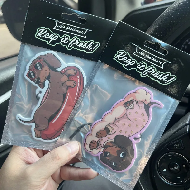 Adorable dachshund-patterned car air freshener pendant with a delightful sweet fragrance. Featuring a cute cartoon/anime design,