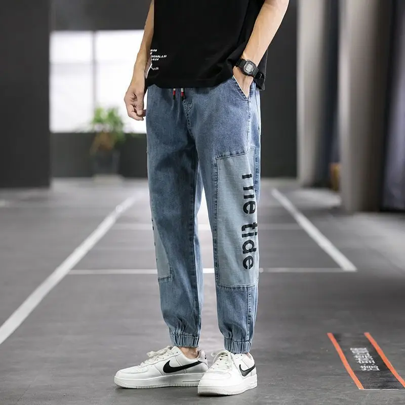 Pantalones vaqueros Cargo empalmados para hombre, ropa de calle con estampado de letras, Hip Hop, moda de otoño, novedad