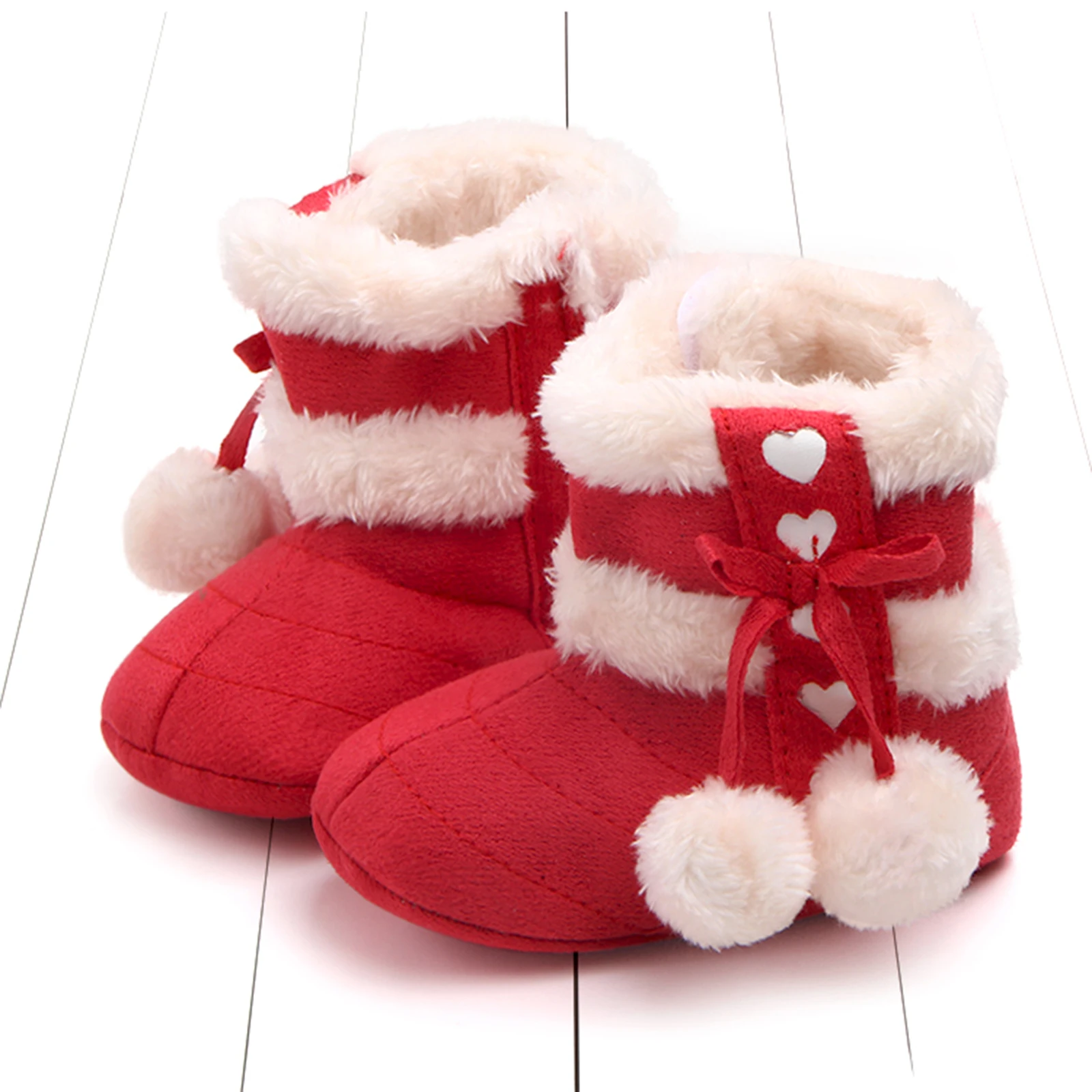 Botas de invierno para niñas recién nacidas, zapatos de nieve con pompones de felpa con lazo lindo, zapatos cálidos para caminar para bebés pequeños