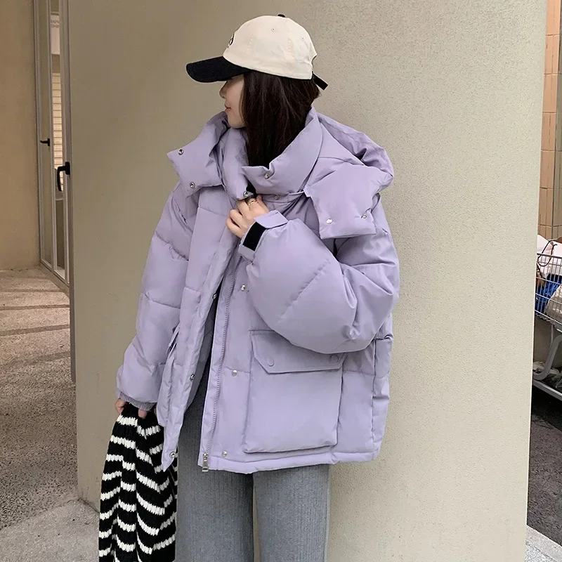 Beliebte Daunen- und Baumwolljacken für Damen im Winter, koreanische Version mit Kapuze, Arbeitskleidung, dicker Baumwolljack-Trend im Hongkong-Stil