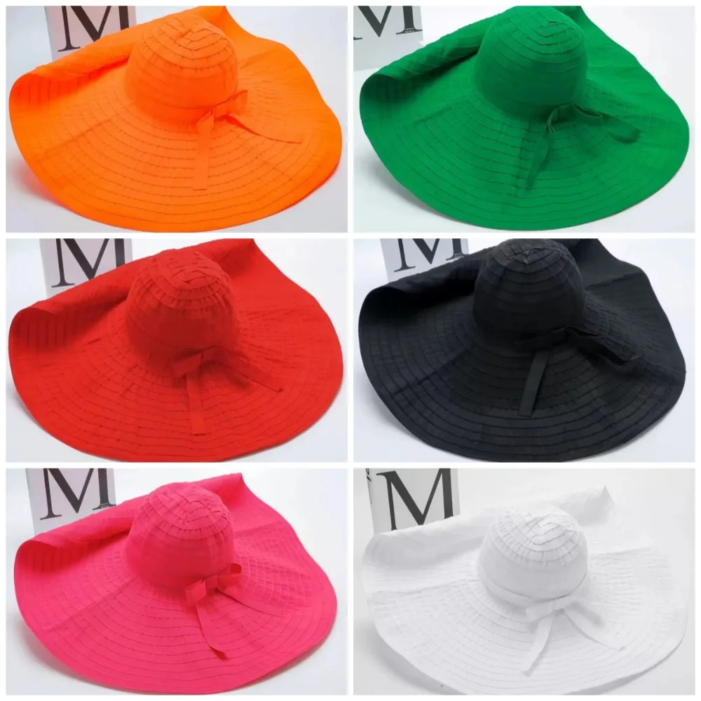 قبعة قابلة للتعبئة بعقدة على شكل فيونكة قابلة للتشكيل ذات حافة واسعة واقية من الشمس وقابلة للطي من البلاستيك قبعة دلو للأشعة فوق البنفسجية ومضادة للتنفس للنساء قبعة الشمس للشاطئ