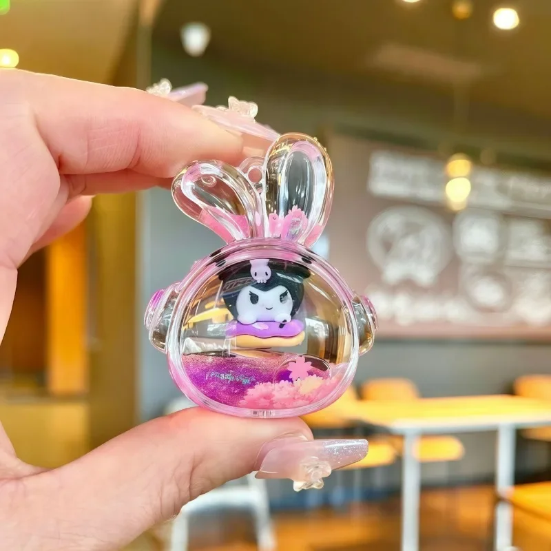 Sanrio Kawaii caja ciega púrpura Kulomi TV muñeca acrílico botella a la deriva Mini adornos de arena movediza llavero bolsa colgante al por mayor