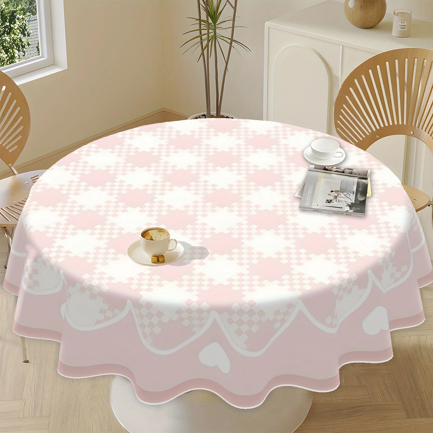 One elegant pink and white checkered and heart-shaped pattern round tablecloth, 62 inches in size, 100% polyester.