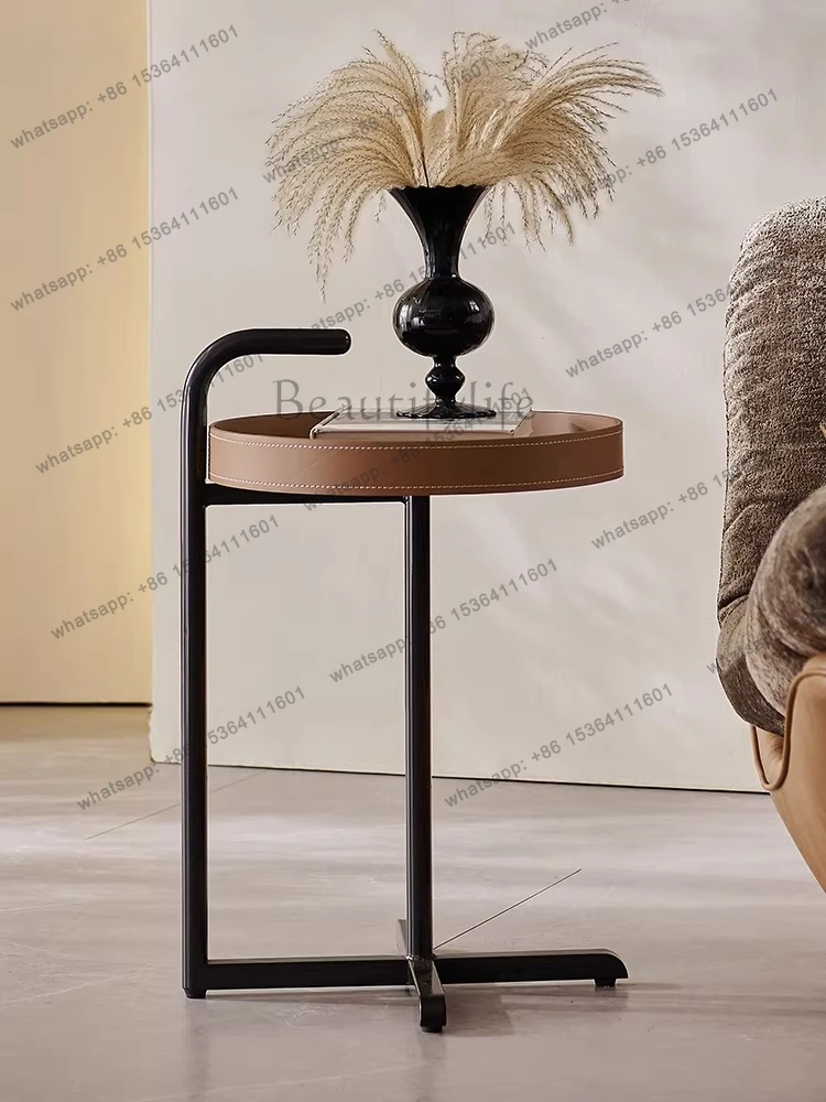 

Italian light luxury corner few saddle leather modern designer wabi sabi wind home high-end small coffee table