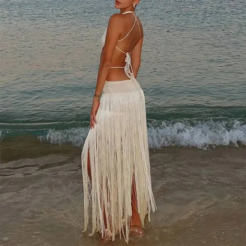 夏休みビーチマキシドレスセクシーなホルタータッセルボヘミアン女性春ソリッドバックレスレースアップロングドレスムヘール