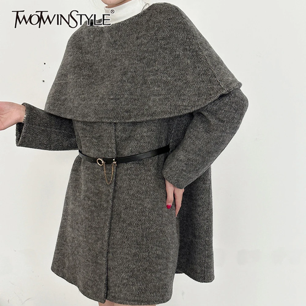 TWOTWINSTYLE Cape Spliced Chain Belt Loose Jacket for Women Round Neck Long Sleeve Patchwork Button Midi Outerwear Female Style