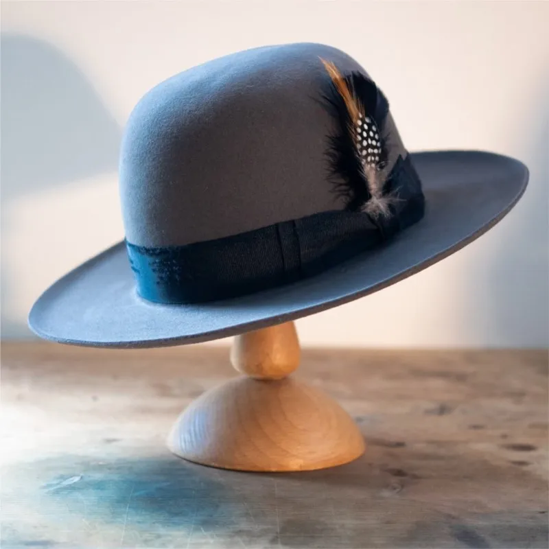 A fashionable and versatile dome felt hat with woven decoration