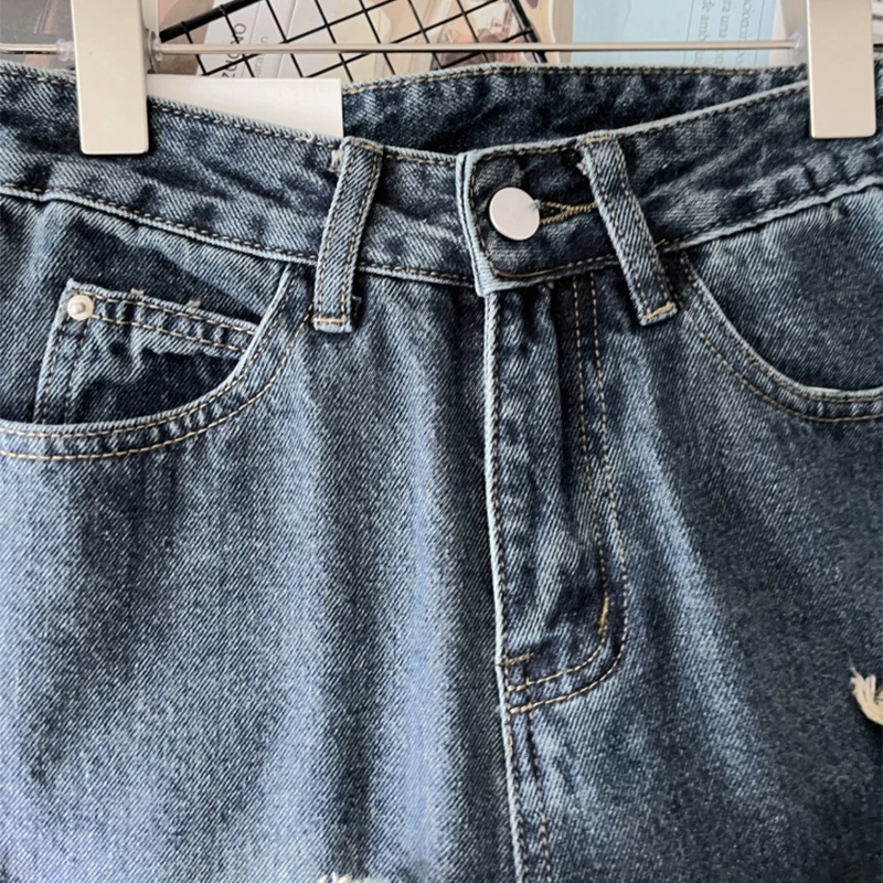 جينز ريترو مغسول عالي الخصر للنساء موضة الخريف حافة خام متعددة الاستخدامات مستقيمة الساق واسعة الساق طول الأرض سروال جديد
