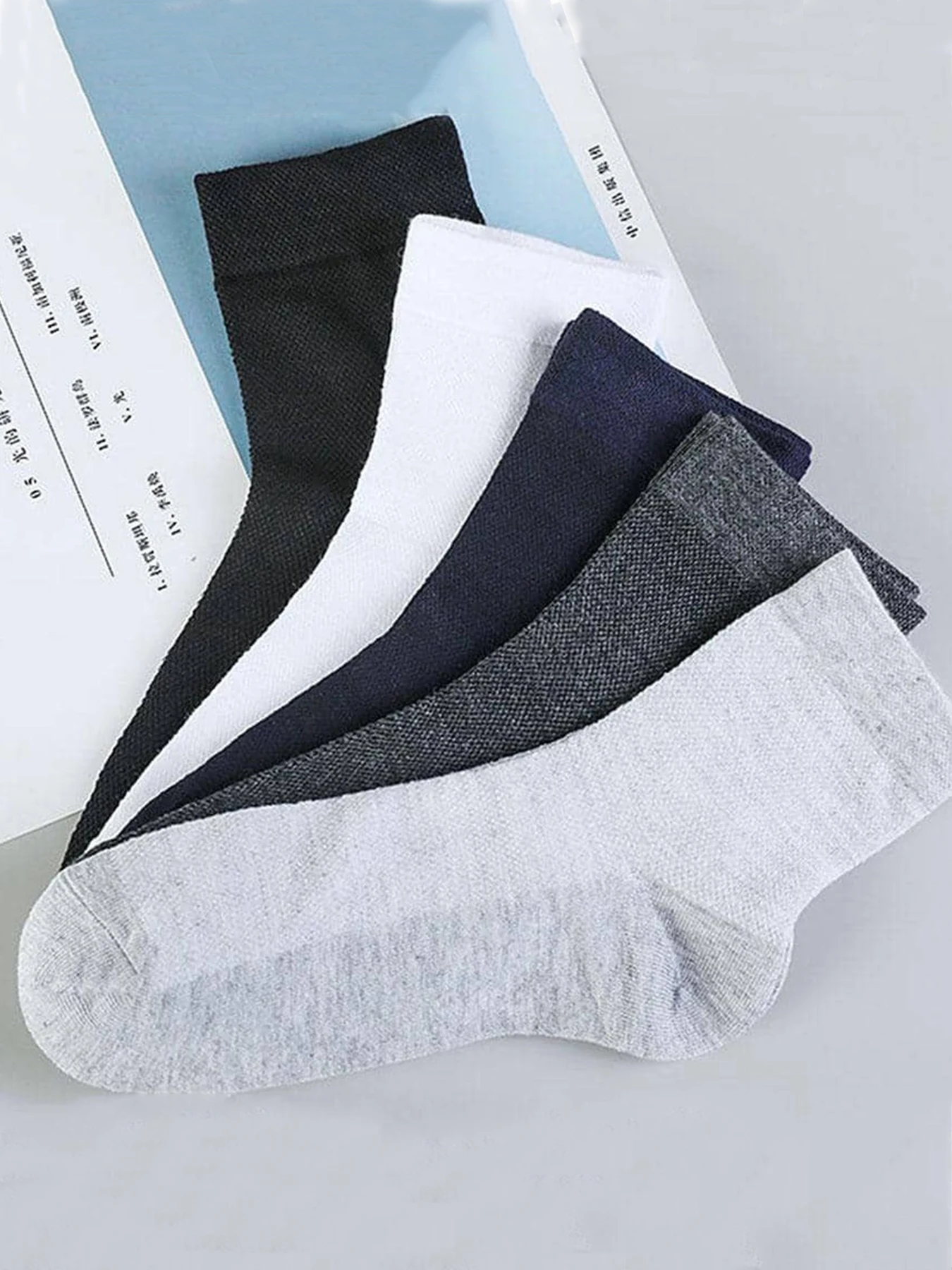 5 pairs of mid-tube socks Men\'s sports socks Black business stockings Wicking sweat and deodorant cotton socks summer