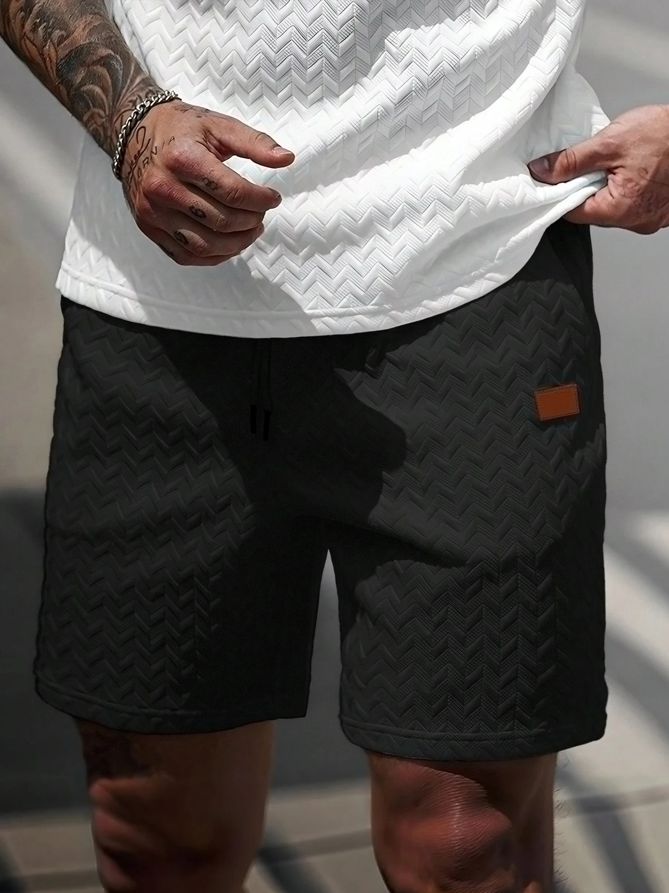 Neue sommerliche Freizeit-Sportshorts: Mit einem gestrickten, leicht dehnbaren Jacquard-Design bieten diese einfarbigen Shorts eine schlichte Optik. – Detail 9