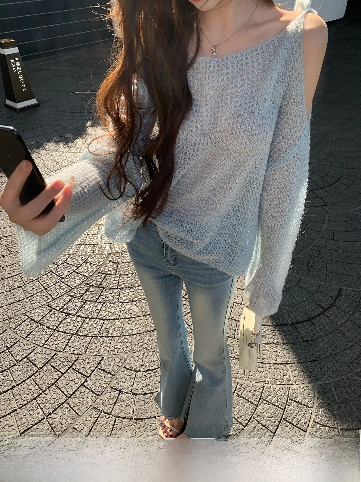 

Синяя ажурная вязаная кофта для женщин от Zhang Yuli: повседневный свободный топ с эффектом похудения, весенняя коллекция, простой дизайн, длинный рукав, круглый вырез