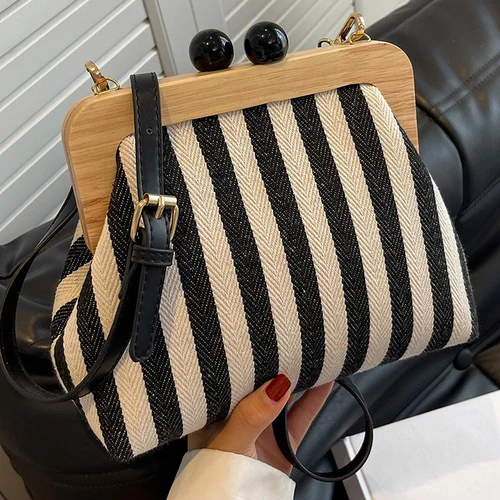 Bolso con clip a rayas de estilo retro personalizado, hebilla versátil, diseño de nicho de un solo hombro, bolso cruzado para mujer, mochila informal